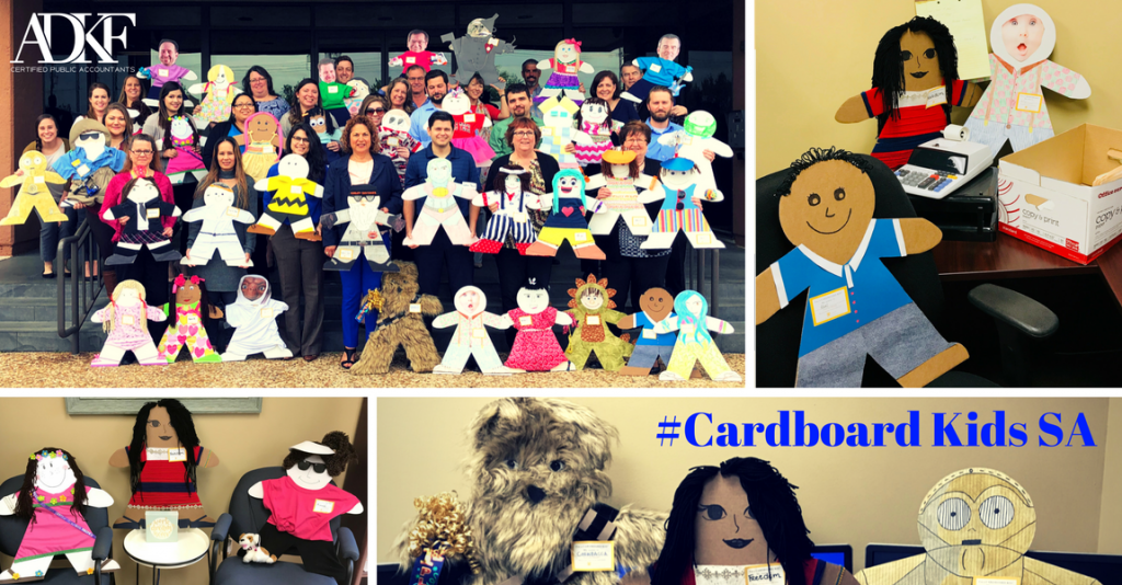 Colorful cardboard cutouts of children