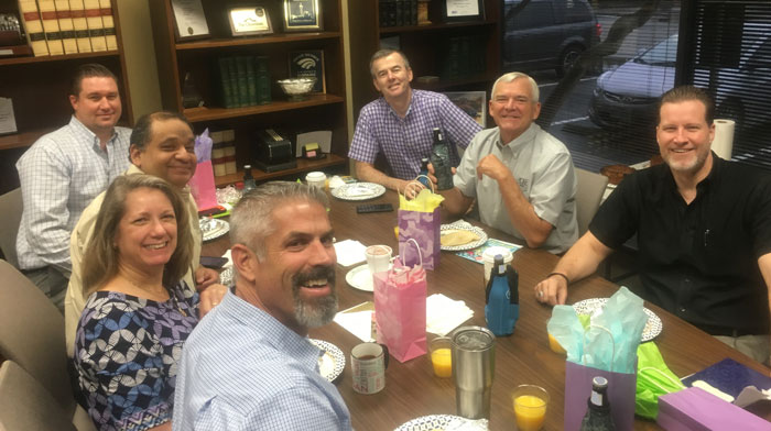 Group celebrating National Boss's Day together.