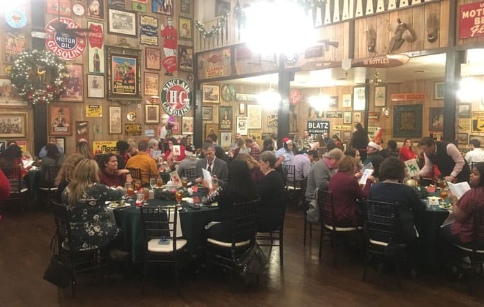 People dining in a festive restaurant.