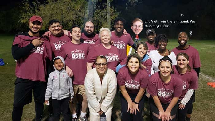 Group photo at a sports event.