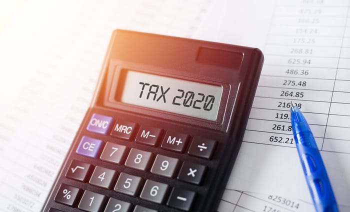 Calculator displaying 'TAX 2020' text