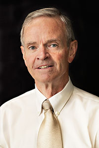 Man in a white dress shirt.