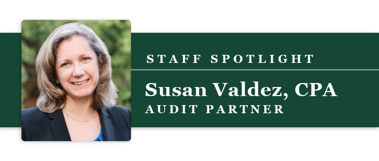 Professional portrait of audit partner.