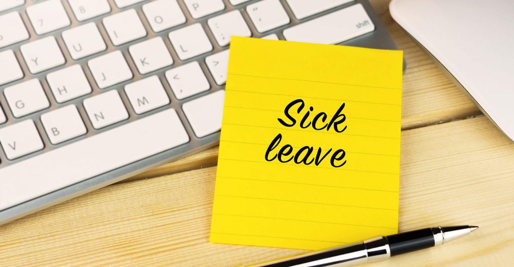 Yellow note saying 'Sick leave'