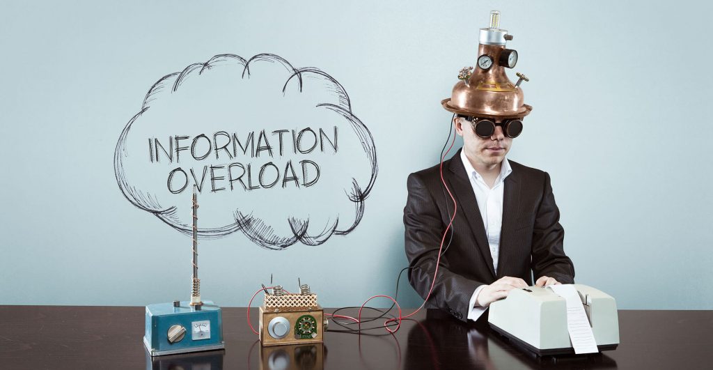 Person with device experiencing information overload.