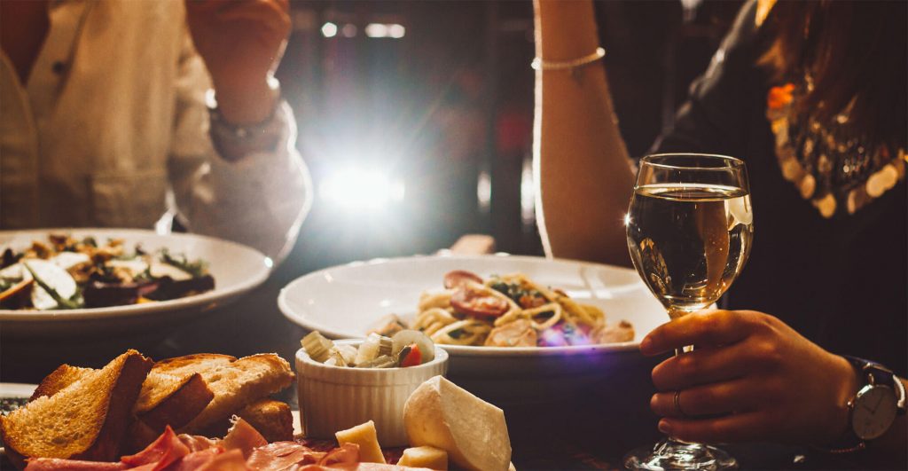 Dining table with food and drinks