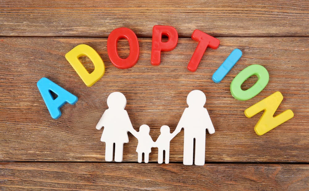 Colorful letters spelling adoption theme