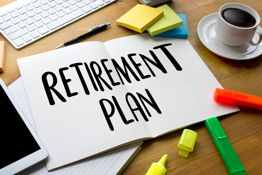 Notebook with retirement plan text