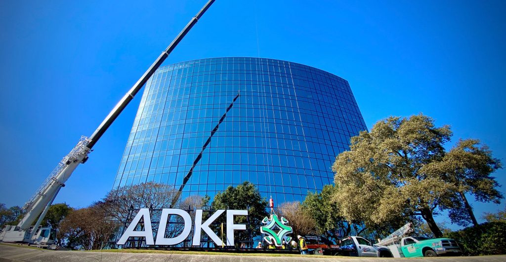 Modern building with ADKF signage.