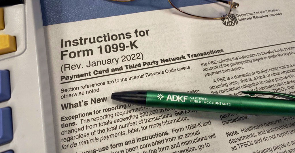 Tax form instructions and pen