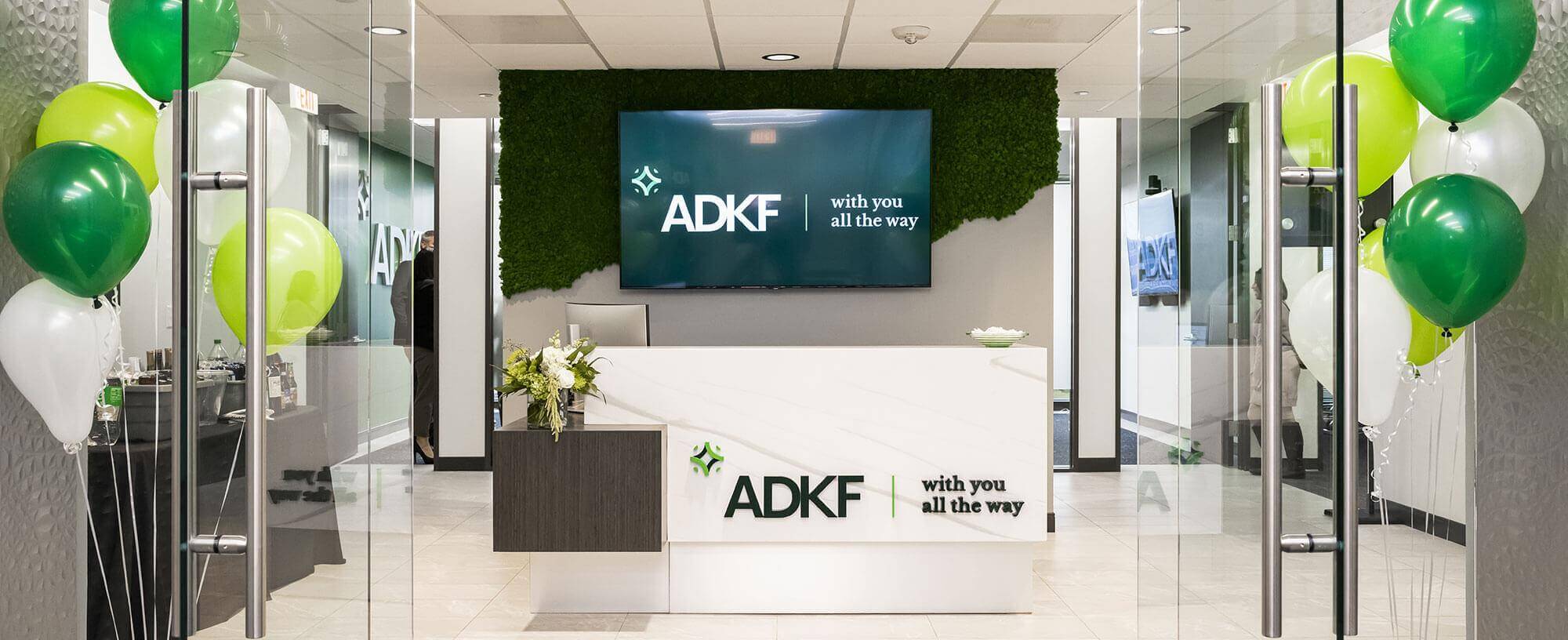 Modern office reception with balloons.