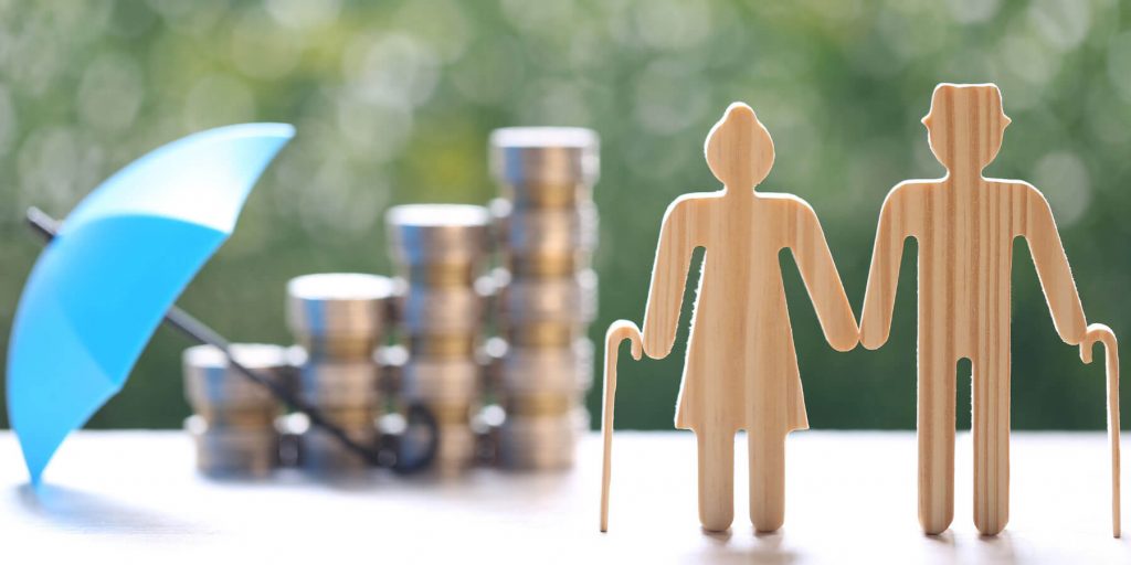 Retirement planning with wooden figures
