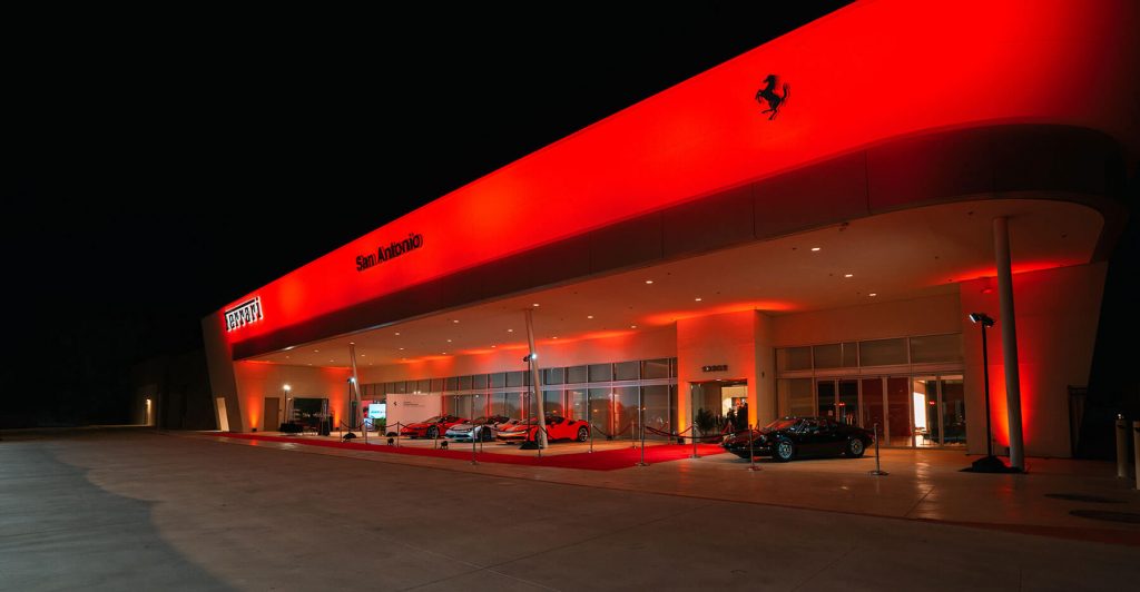 Ferrari dealership illuminated at night