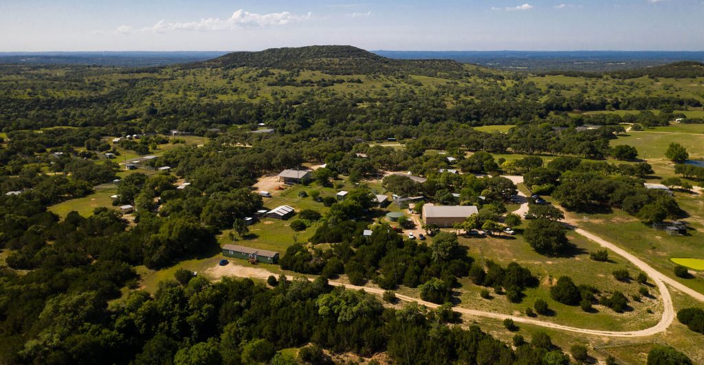 Aerial view of green countryside landscape.