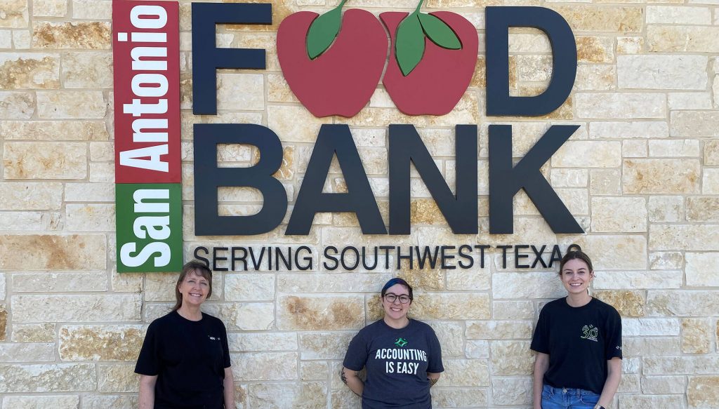 People standing in front of food bank.