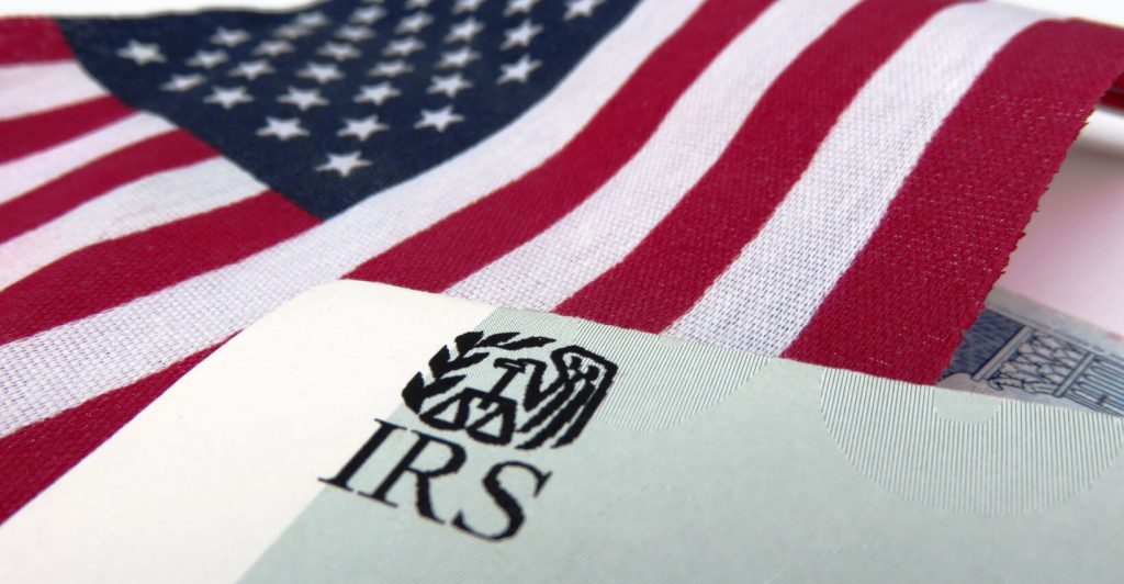 IRS card on American flag background