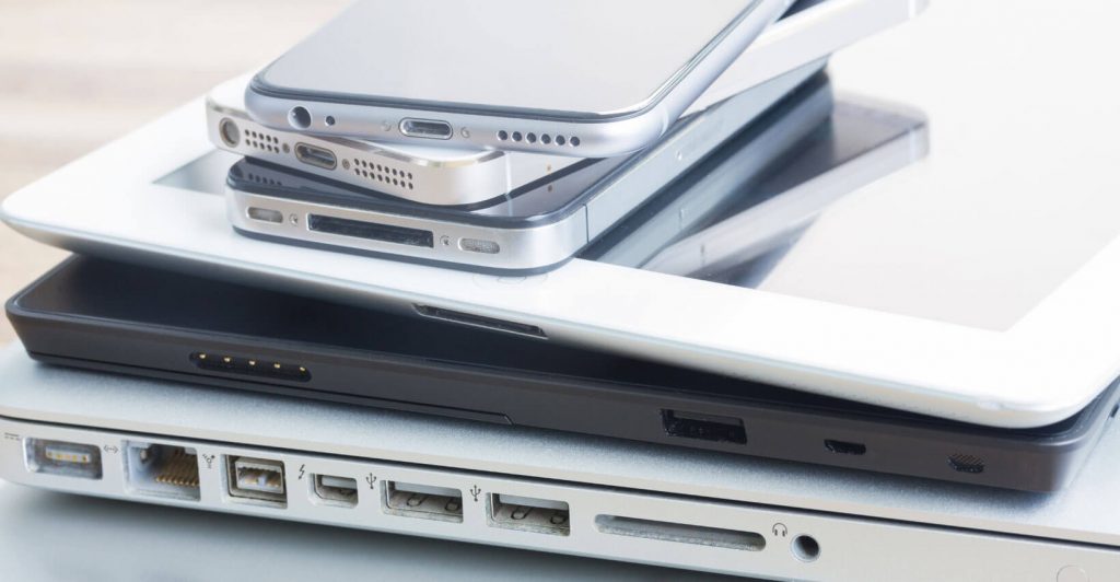Stack of various electronic devices.