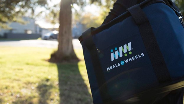 Meals on Wheels delivery bag outdoors.