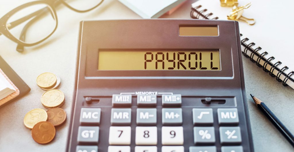 Calculator displaying payroll information.