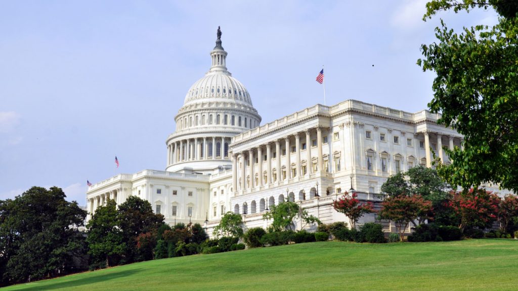 U.S. Capitol building on green lawn