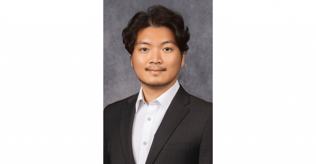 Professional portrait in formal attire.