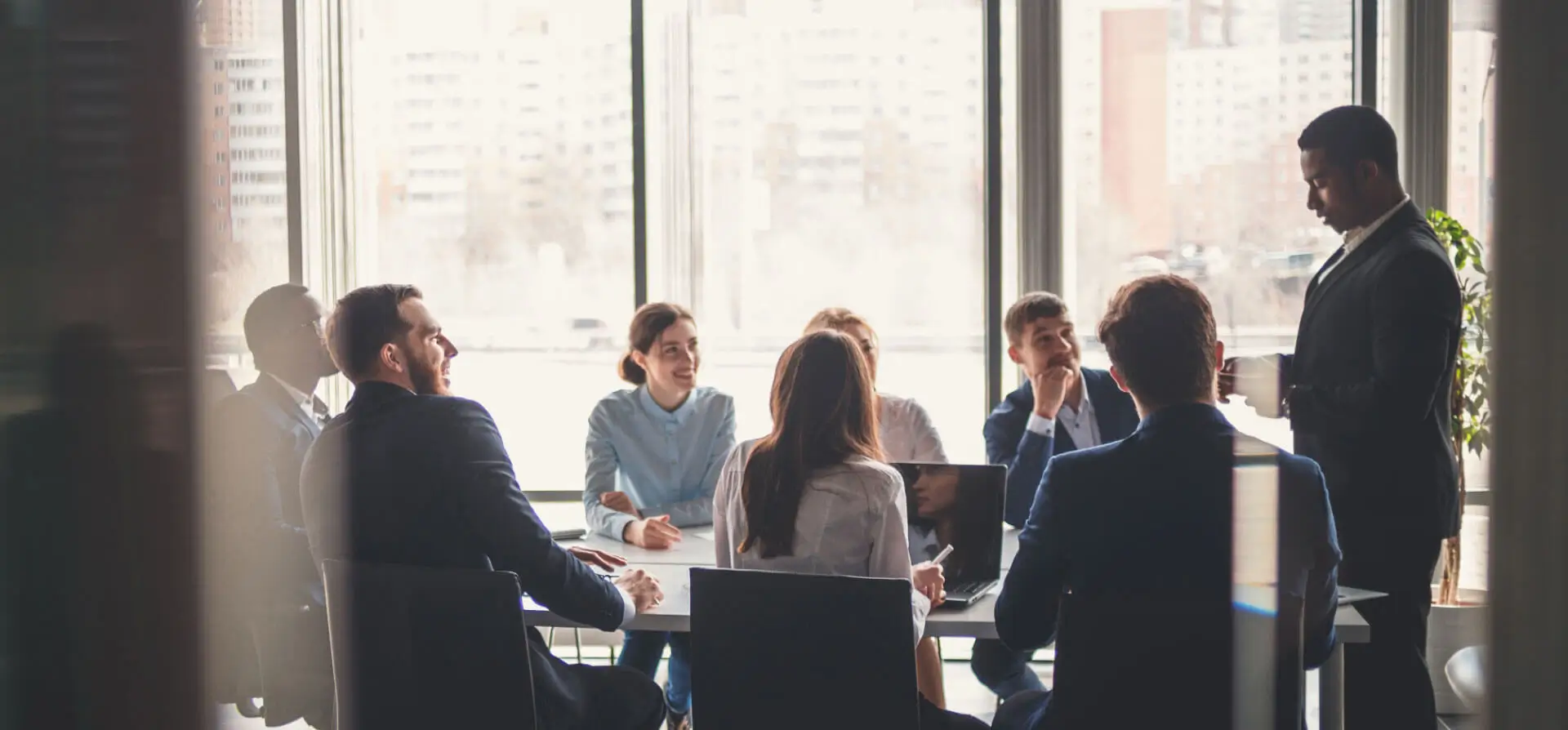 Business meeting in modern office setting.
