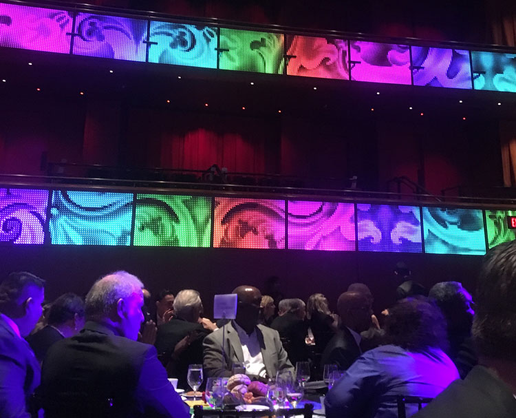 Vibrant event with colorful lighting displays.